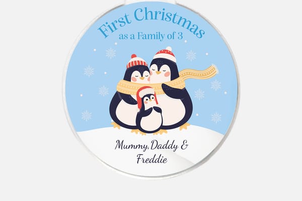 “First Christmas as a family of 3” penguin decoration from You Personalise